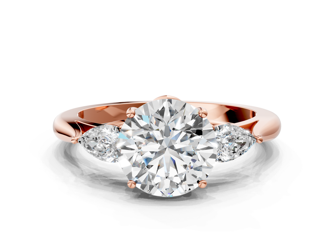 Rose gold Three-Stone Round Cut Diamond Ring with Pear Side Stones in Four-Prong Setting_157