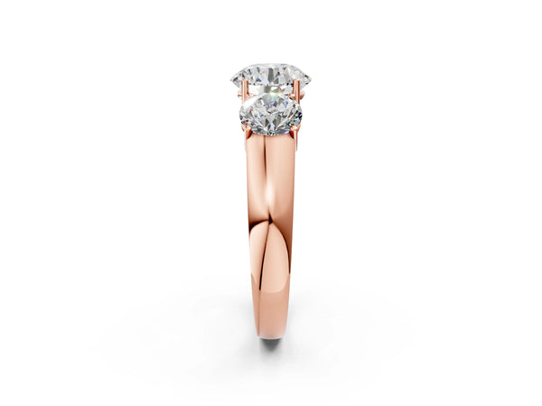 Rose gold Three-Stone Round Cut Diamond Ring with Prong Setting and Classic Band