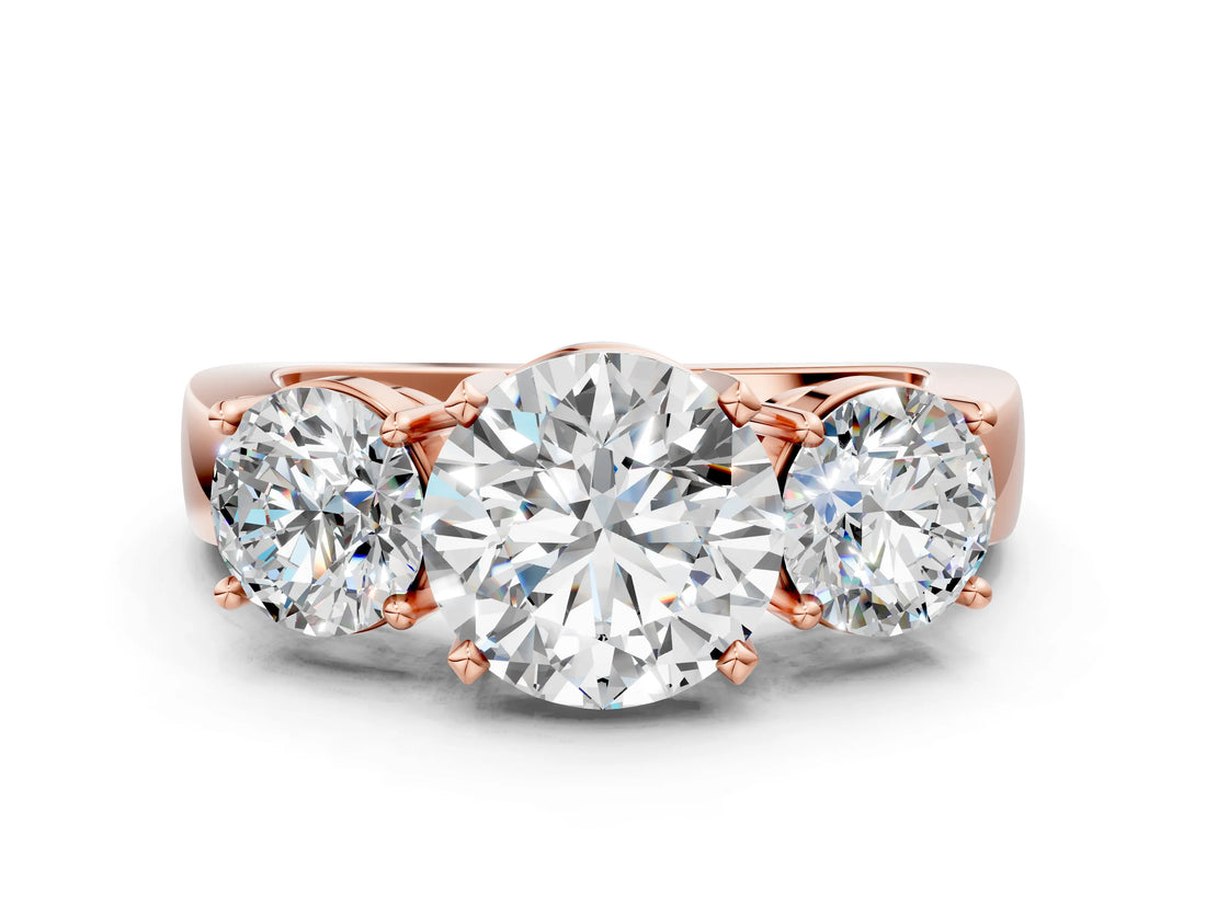 Rose gold Three-Stone Round Cut Diamond Ring with Round Side Stones, Classic Band, and Four-Prong Setting_3