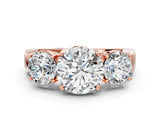 Rose gold Three-Stone Round Cut Diamond Ring with Round Side Stones, Classic Band, and Four-Prong Setting_3