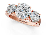 Rose gold Three-Stone Round Cut Diamond Ring with Round Side Stones, Classic Band, and Four-Prong Setting_4