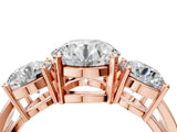 Rose gold Three-Stone Round Cut Diamond Ring with Round Side Stones, Classic Band, and Four-Prong Setting_7