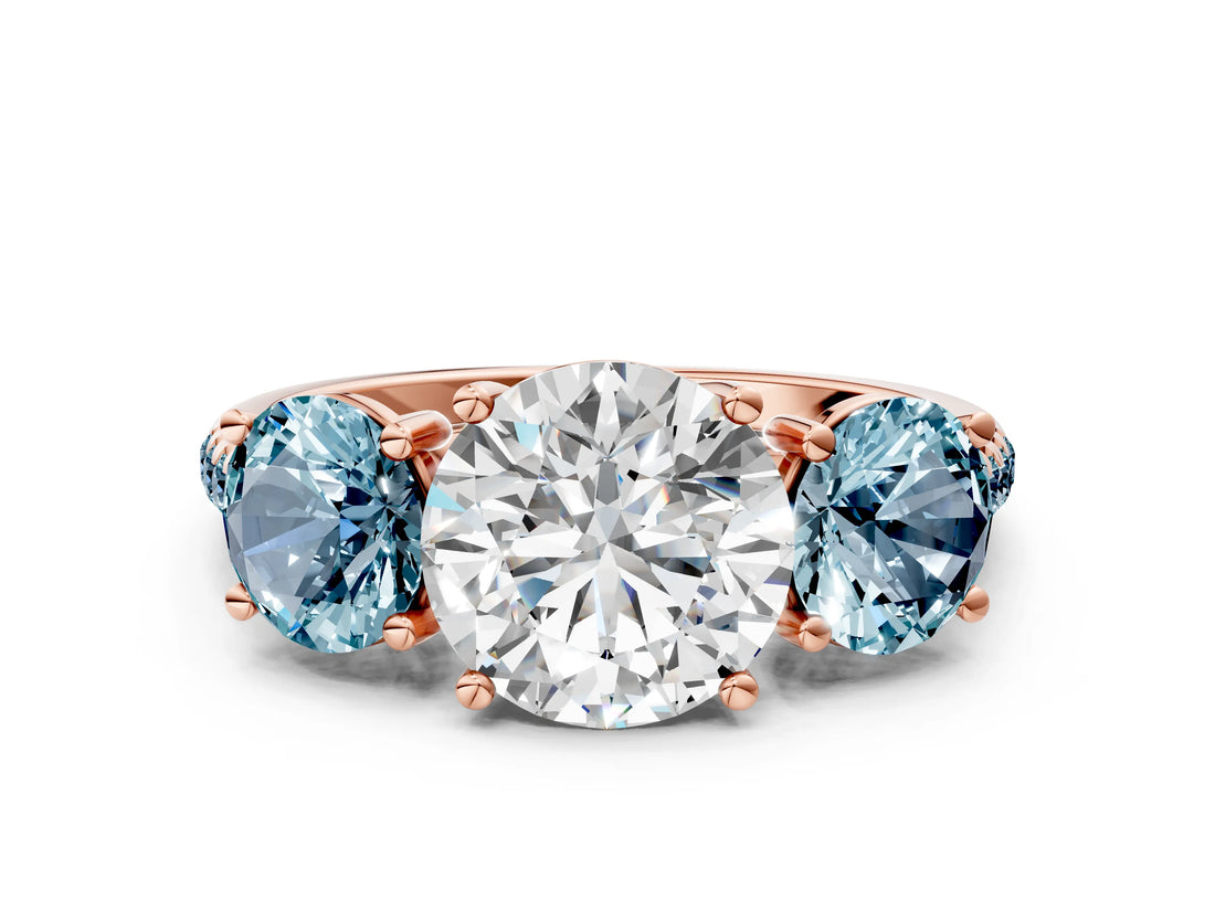 Rose gold Three-Stone Round Cut Diamond Ring with Round with Aquamarine side stone Pavé Band and Prong Setting