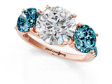 Rose gold Three-Stone Round Cut Diamond Ring with Round with Blue Topaz side stone Pavé Band and Prong Setting_1
