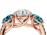 Rose gold Three-Stone Round Cut Diamond Ring with Round with Blue Topaz side stone Pavé Band and Prong Setting_4