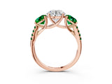 Rose gold Three-Stone Round Cut Diamond Ring with Round with Emerald side stone Pavé Band and Prong Setting_3