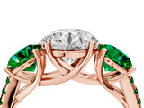 Rose gold Three-Stone Round Cut Diamond Ring with Round with Emerald side stone Pavé Band and Prong Setting_4