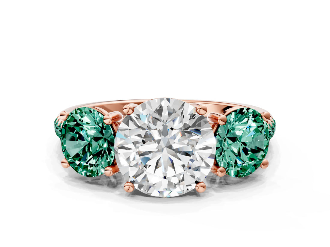 Rose gold Three-Stone Round Cut Diamond Ring with Round with Green Sapphire side stone Pavé Band and Prong Setting