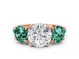 Rose gold Three-Stone Round Cut Diamond Ring with Round with Green Sapphire side stone Pavé Band and Prong Setting