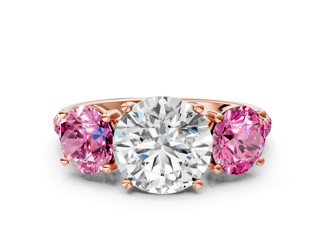 Rose gold Three-Stone Round Cut Diamond Ring with Round with Pink Sapphire side stone Pavé Band and Prong Setting