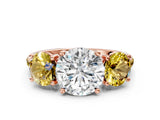 Rose gold Three-Stone Round Cut Diamond Ring with Round with Yellow Sapphire side stone Pavé Band and Prong Setting