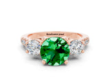 Rose gold Three-Stone Round Cut Emerald Pavé Band with Four-Prong Setting