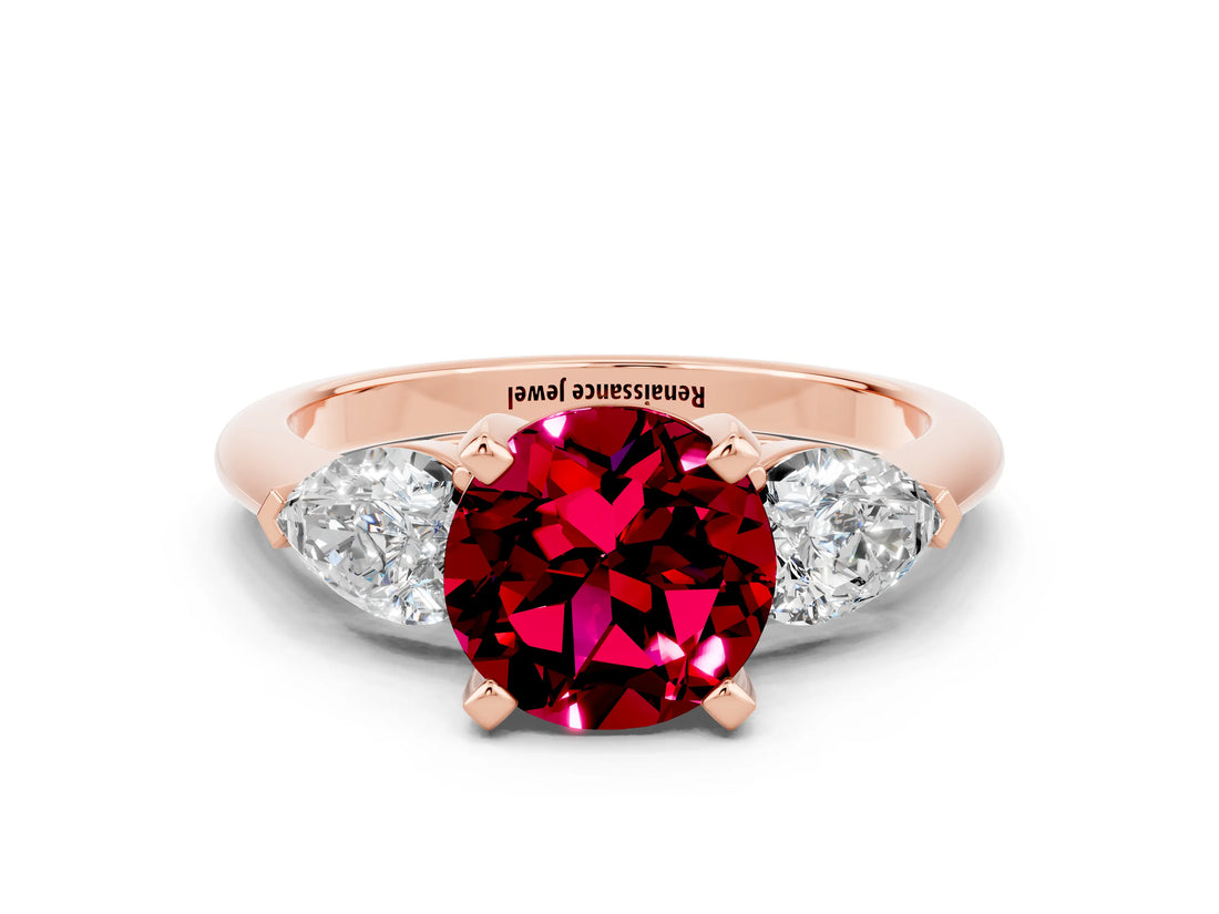 Rose gold Three-Stone Round Cut Garnet Ring with Pear Side Stones and Four-Prong Setting