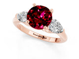 Rose gold Three-Stone Round Cut Garnet Ring with Pear Side Stones and Four-Prong Setting_1