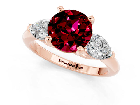 Rose gold Three-Stone Round Cut Garnet Ring with Pear Side Stones and Four-Prong Setting_1