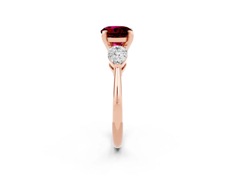 Rose gold Three-Stone Round Cut Garnet Ring with Pear Side Stones and Four-Prong Setting_2