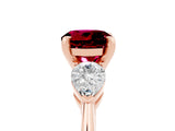 Rose gold Three-Stone Round Cut Garnet Ring with Pear Side Stones and Four-Prong Setting_5