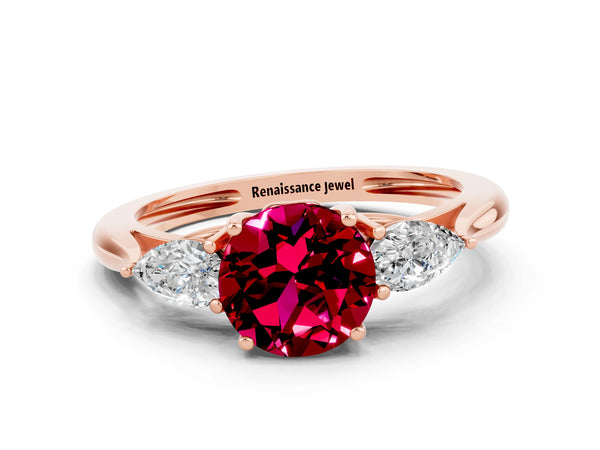 Rose gold Three-Stone Round Cut Garnet Ring with Pear  Side Stones in Four-Prong Setting