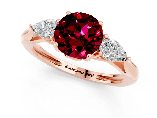 Rose gold Three-Stone Round Cut Garnet Ring with Pear  Side Stones in Four-Prong Setting