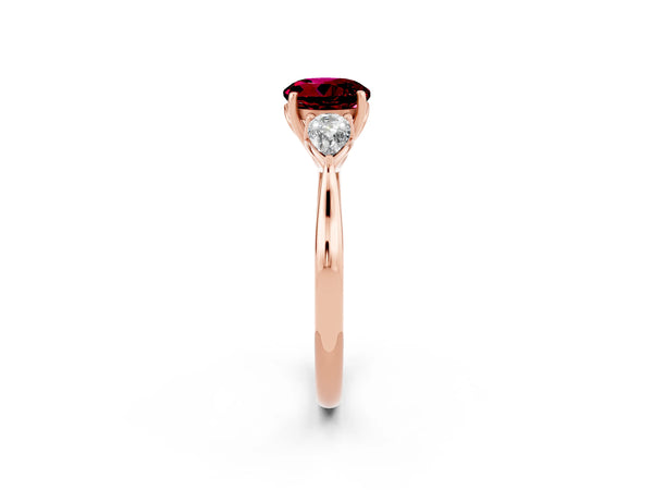 Rose gold Three-Stone Round Cut Garnet Ring with Pear  Side Stones in Four-Prong Setting