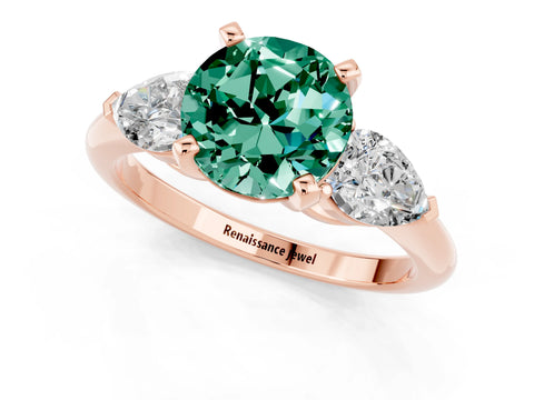 Rose gold Three-Stone Round Cut Green Sapphire Ring with Pear Side Stones and Four-Prong Setting_1
