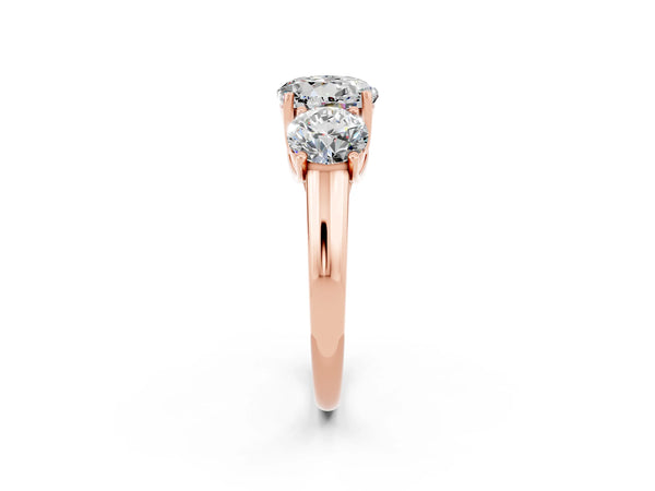 Rose gold Three-Stone Round Cut Moissanite Engagement Ring with Prong Setting