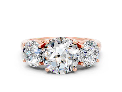 Rose gold Three-Stone Round Cut Moissanite Engagement Ring with Prong Setting
