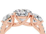 Rose gold Three-Stone Round Cut Moissanite Ring with Pavé Band and Prong Setting_16