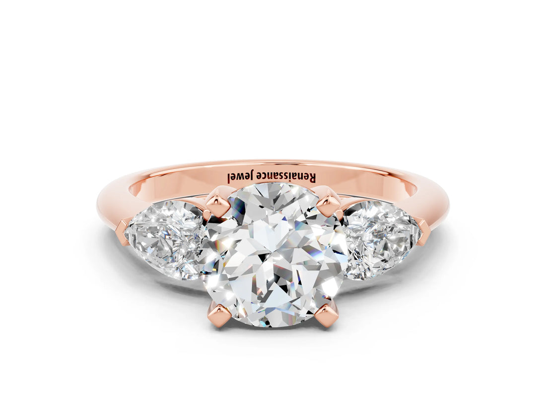 Rose gold Three-Stone Round Cut Moissanite Ring with Pear Side Stones and Four-Prong Setting