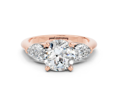 Rose gold Three-Stone Round Cut Moissanite Ring with Pear Side Stones and Four-Prong Setting