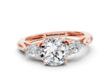 Rose gold Three-Stone Round Cut Moissanite Ring with Pear  Side Stones in Four-Prong Setting_12