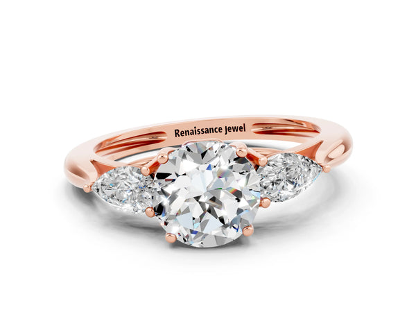 Rose gold Three-Stone Round Cut Moissanite Ring with Pear  Side Stones in Four-Prong Setting