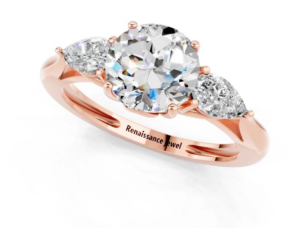 Rose gold Three-Stone Round Cut Moissanite Ring with Pear  Side Stones in Four-Prong Setting