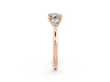 Rose gold Three-Stone Round Cut Moissanite Ring with Pear  Side Stones in Four-Prong Setting_14