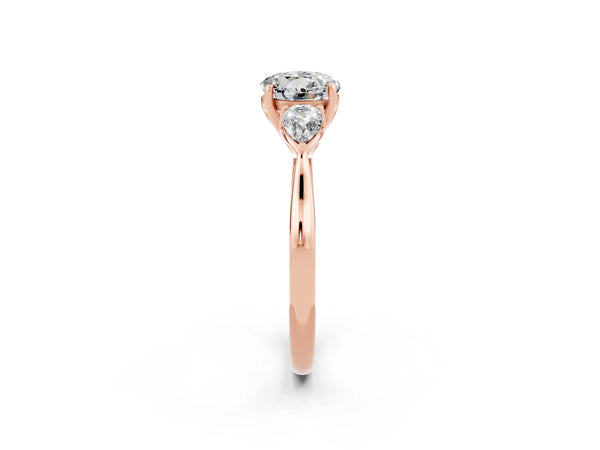 Rose gold Three-Stone Round Cut Moissanite Ring with Pear  Side Stones in Four-Prong Setting