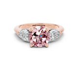 Rose gold Three-Stone Round Cut Morganite Ring with Pear Side Stones and Four-Prong Setting