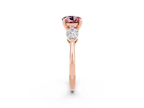 Rose gold Three-Stone Round Cut Morganite Ring with Pear Side Stones and Four-Prong Setting