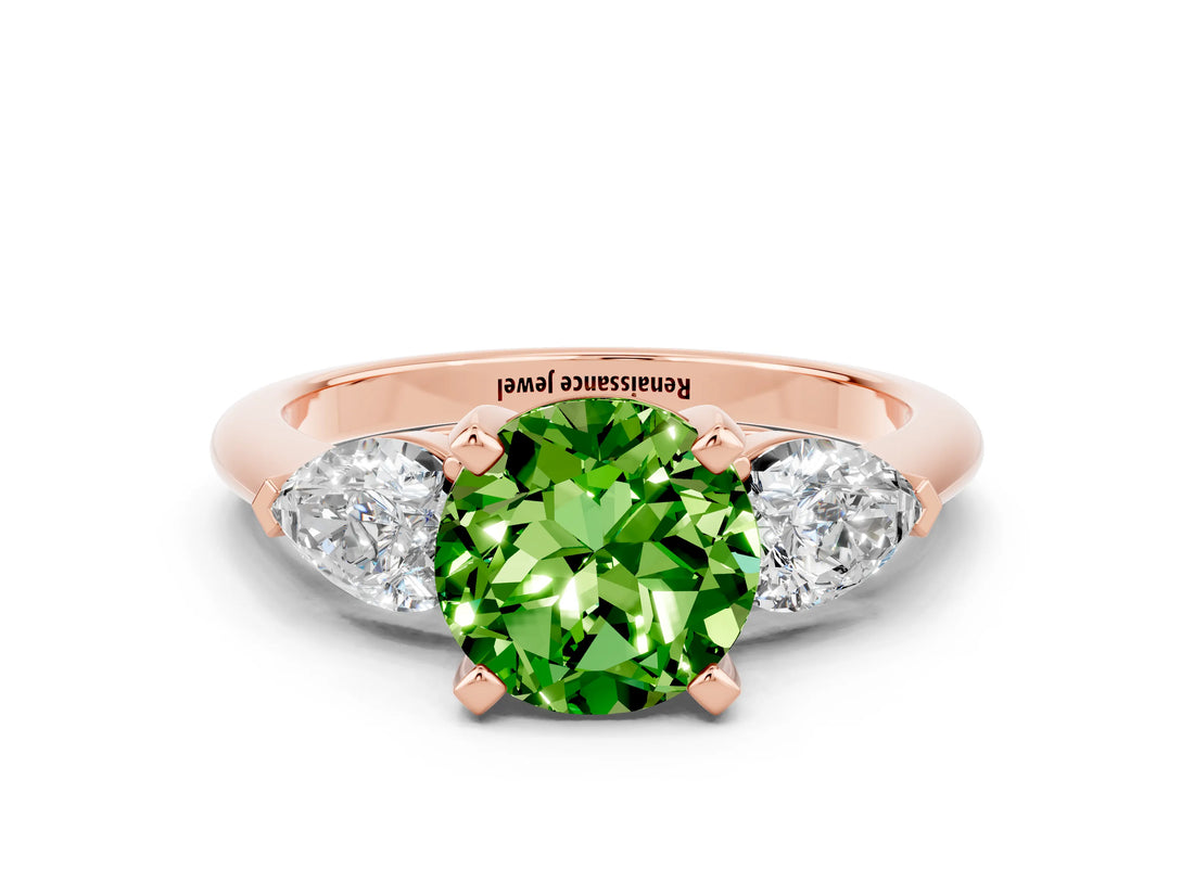 Rose gold Three-Stone Round Cut Peridot Ring with Pear Side Stones and Four-Prong Setting