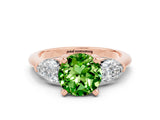 Rose gold Three-Stone Round Cut Peridot Ring with Pear Side Stones and Four-Prong Setting