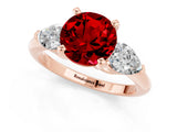 Rose gold Three-Stone Round Cut Ruby Ring with Pear Side Stones and Four-Prong Setting_1