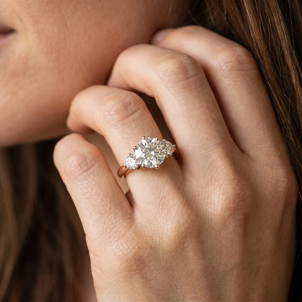 Rose gold Three-Stone Round Cut Solitaire Diamond Ring with Prong Setting