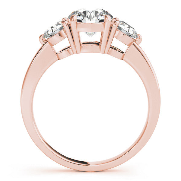 Rose gold Three-Stone Round Cut Solitaire Ring with Prong Setting on a Classic Band 1