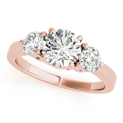 Rose gold Three-Stone Round Cut Solitaire Ring with Prong Setting on a Classic Band