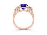 Rose gold Three-Stone Round Cut Tanzanite Ring with Pavé Band and Prong Setting_15