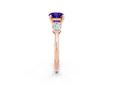 Rose gold Three-Stone Round Cut Tanzanite Ring with Pear Side Stones and Four-Prong Setting_2