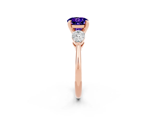 Rose gold Three-Stone Round Cut Tanzanite Ring with Pear Side Stones and Four-Prong Setting