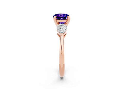 Rose gold Three-Stone Round Cut Tanzanite Ring with Pear Side Stones and Four-Prong Setting_2