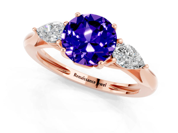 Rose gold Three-Stone Round Cut Tanzanite Ring with Pear  Side Stones in Four-Prong Setting