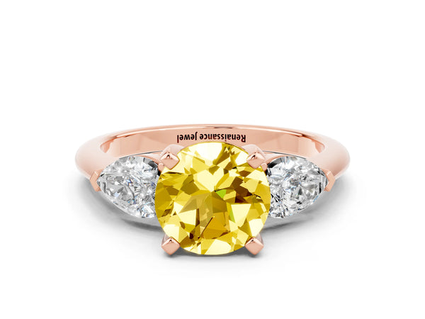 Rose gold Three-Stone Round Cut Yellow Sapphire Ring with Pear Side Stones and Four-Prong Setting