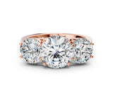 Rose gold Three-Stone Round Diamond Engagement Ring with Prong Setting on a Classic Band_11